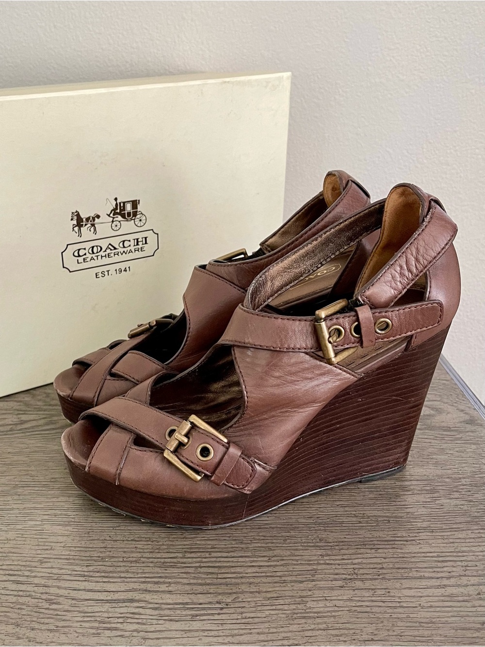 Coach | “Shannon” Leather Buckle Wedge Sandals in Espresso Brown